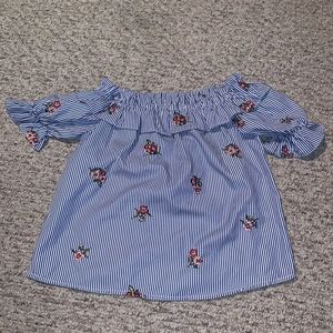 Blue and white off the shoulder shirt with flowers